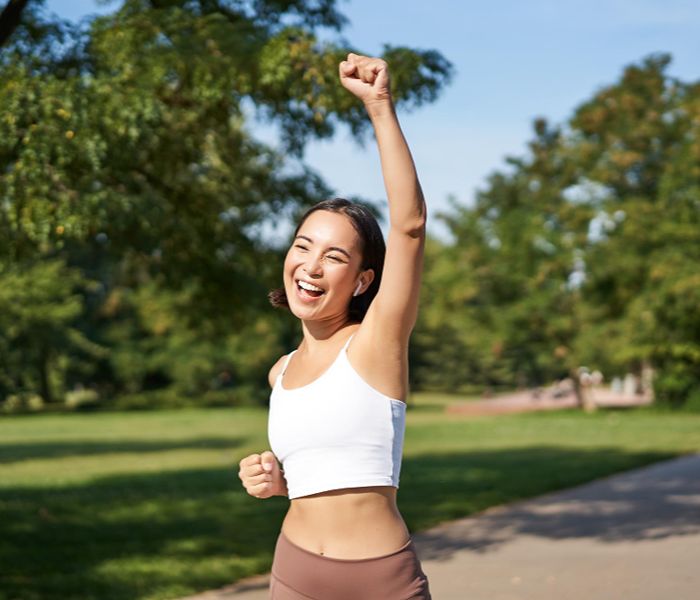 Woman doing physical exercise outdoor