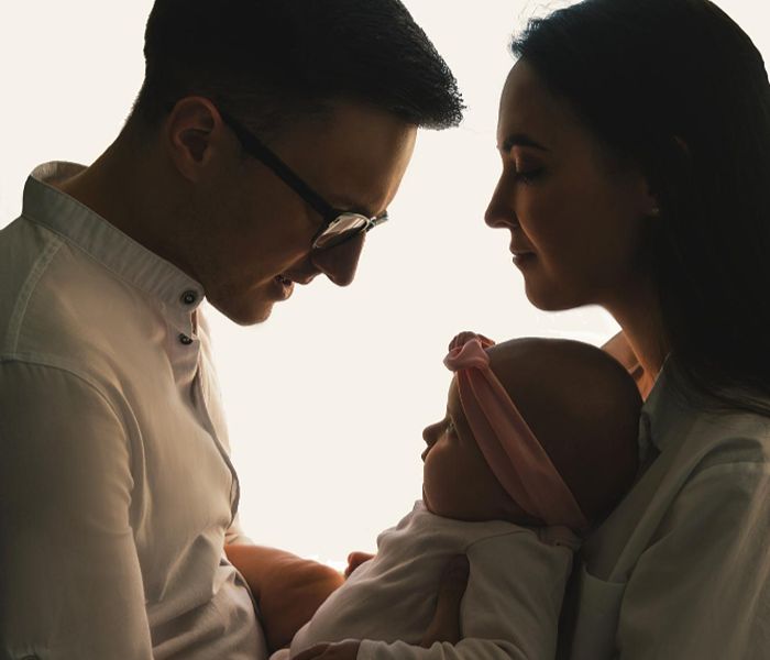 Young couple with their baby