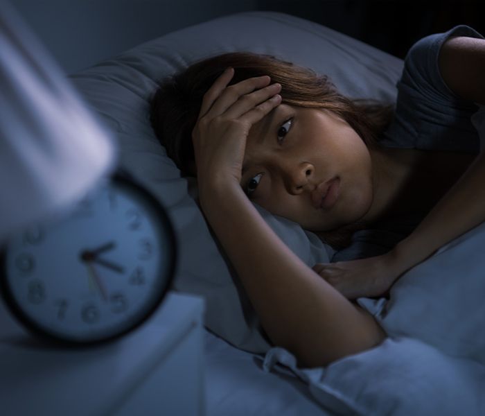 Woman trouble falling asleep