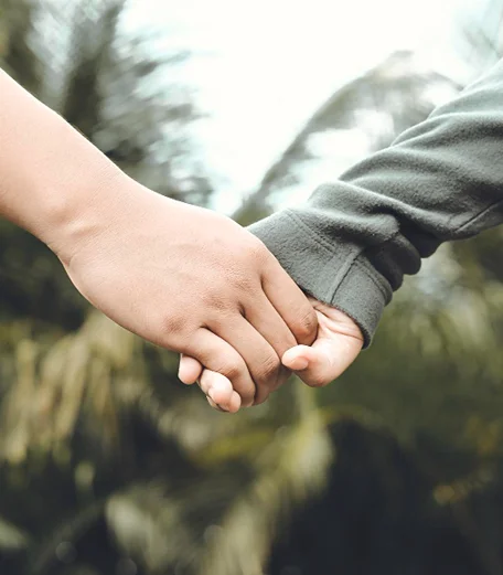 Couple holding hands